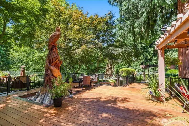 “Custom cedar tree carving crafted by Tomas Vrba.” “Custom cedar tree carving crafted by Tomas Vrba.”