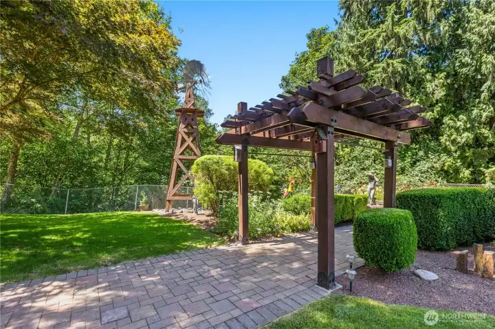 "View of the arbor and windmill." "View of the arbor and windmill."