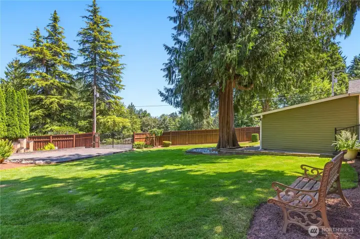 “Spacious gated entrance providing easy access to the detached garage.” “Spacious gated entrance providing easy access to the detached garage.”