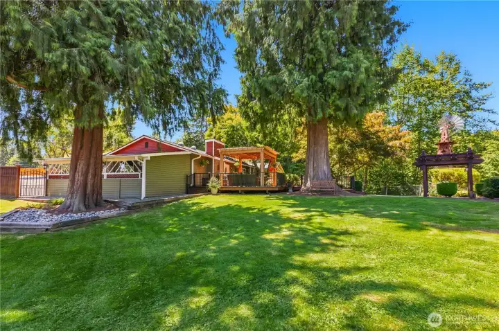 “Beautiful view of the home, featuring a spacious, well-lit carport and illuminated pathway.” “Beautiful view of the home, featuring a spacious, well-lit carport and illuminated pathway.”