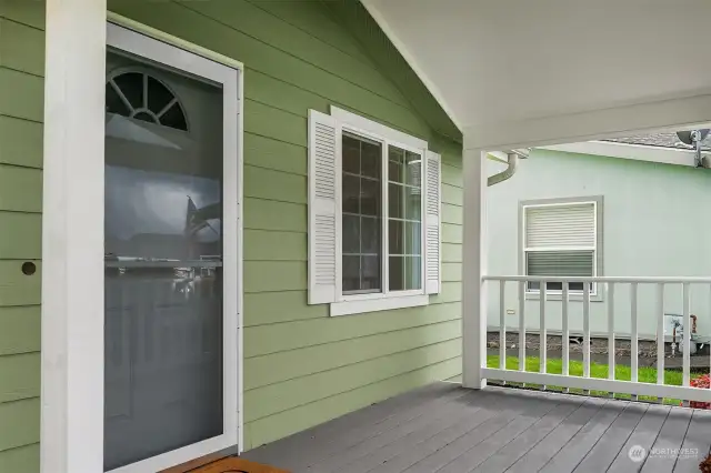 The rocking chair front porch welcomes you home.