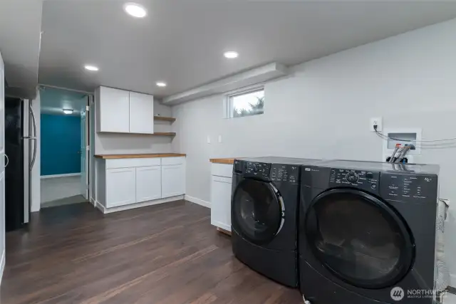 Lower level utility are with extra fridge and tons of cabinet storage