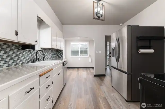 Updated kitchen with breakfast nook and brand new high end fridge
