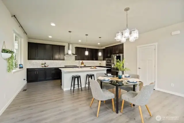 Marble backsplash, countertops, and fireplace — luxury you can feel