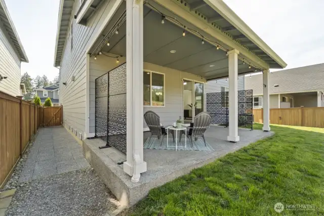 Paved side alley for easy access, dog run, bin storage.