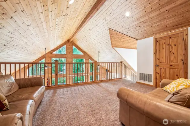 loft family room with view of lower level great room