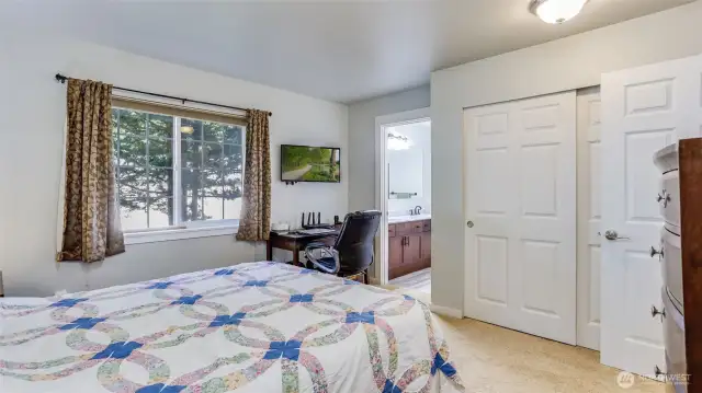 The primary bedroom has 2 sliding door closets and a updated full bath.
