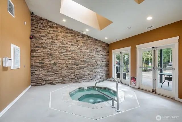 A wonderful interior hot tub protected from weather.
