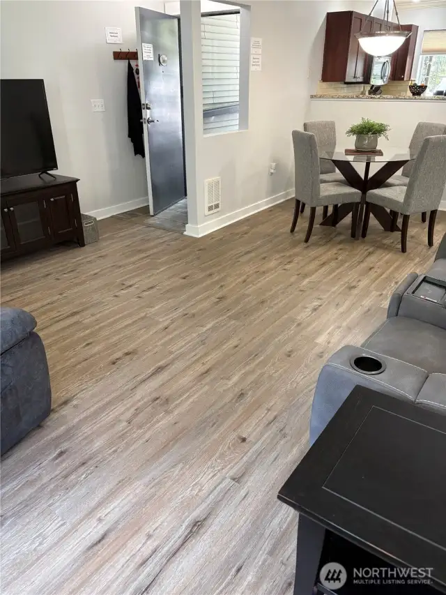 The dining room is light and open.  Close to the updated kitchen.