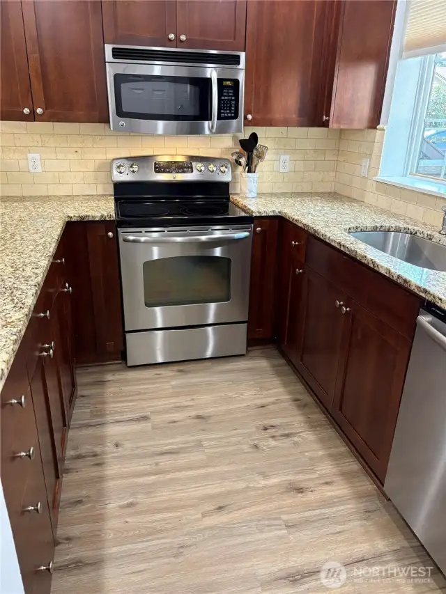 The home has a spacious feeling plus many updates added.