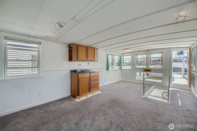 Huge Bonus room on the upper level with a covered BBQ and entertaining deck year round or head out onto two levels of rooftop decks.
