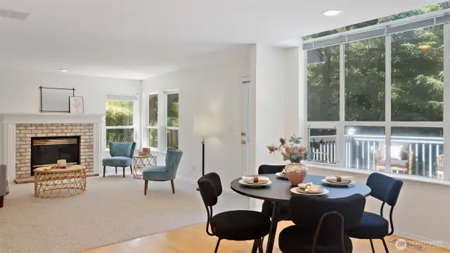 This expansive window floods the space with natural light, creating a bright and inviting atmosphere all day long.