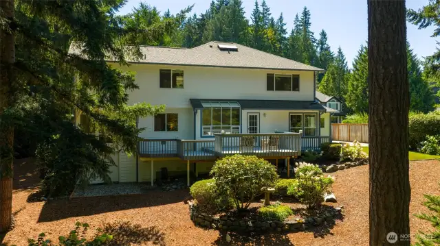 Tucked behind the branches on the left, there's a door opens to an extra-tall crawl space - ideal for massive storage or even your next creative hobby space.