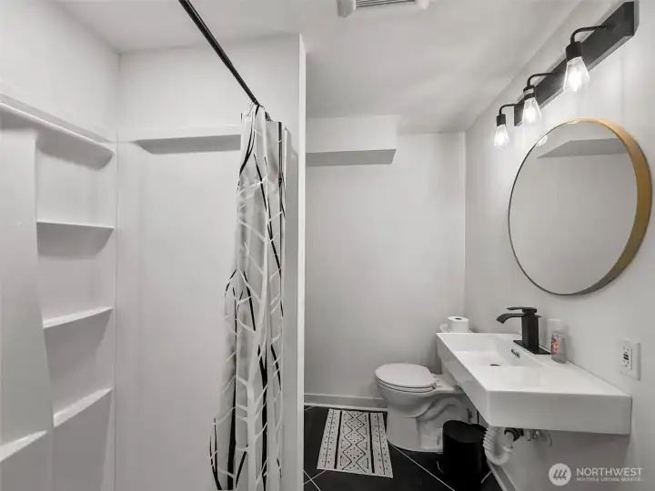 All new fixtures and added a shower to this 3/4 bathroom.