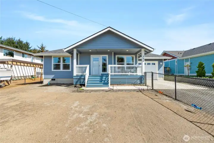 Fully fenced in front of home