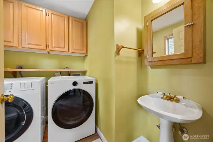 Laundry room with 1/2 bathroom