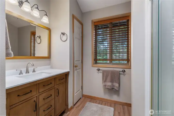 Three-quarter bath off upstairs primary