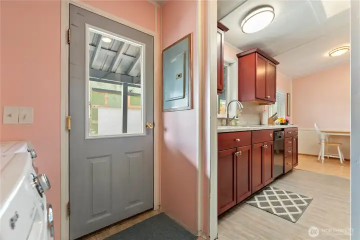 Back entry into mudroom/laundry room.