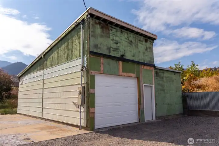 Large garage with room for 2 cars and toys!