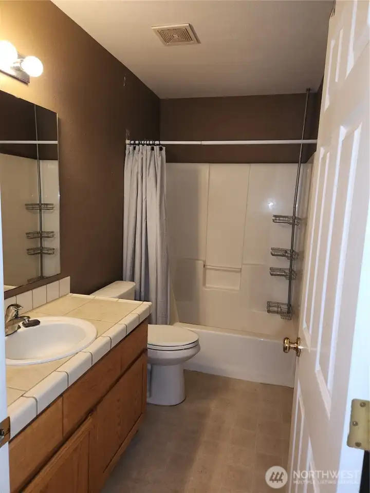 Guest bathroom off hallway.