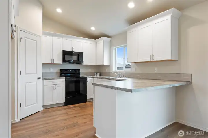 Photo of previously built home. Home may feature additional upgrades not available. Photos/build my vary.