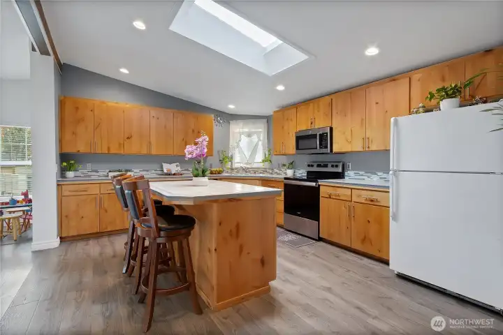 Spacious kitchen featuring island