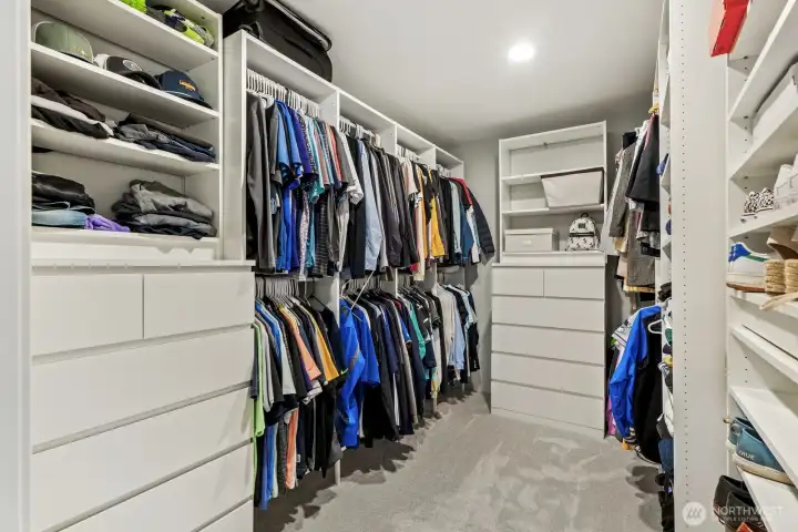 Walkin closet in the primary bedroom