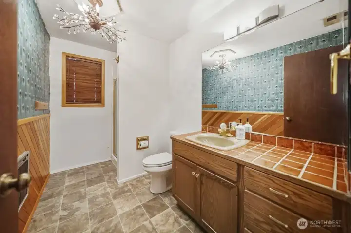 3/4 bathroom next to kitchen