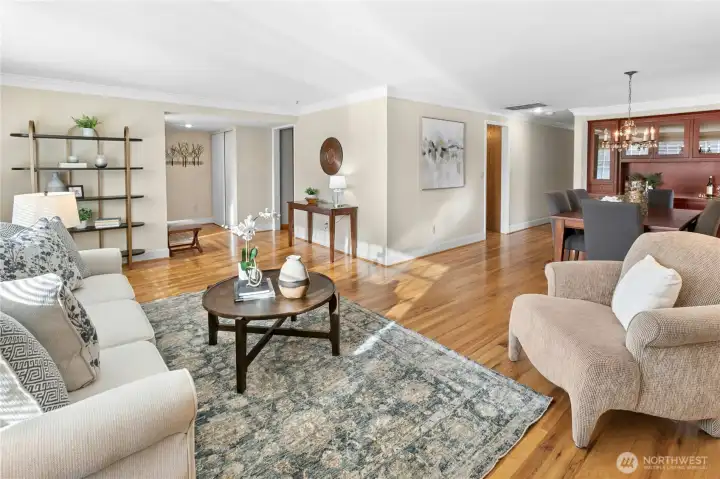 The living room extends into the large dining room for flexibility in entertaining.