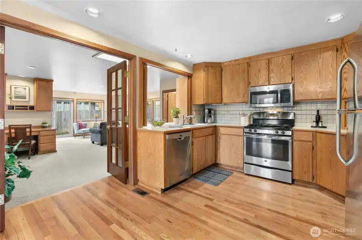 This kitchen is the heart of the home and connects the living, dining and family rooms.