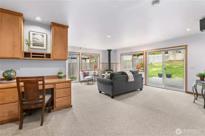 The built-in desk in the family room is great space for working at home or as a homework center.