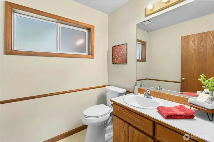The powder room is also conveniently off the family room.