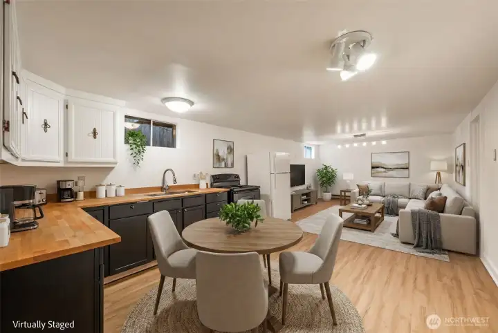 Lower level is all virtual staging. Lower level MIL apt- over 1000 sqft with its own outside entry or take the stairs down from the kitchen. Large full size kitchen.