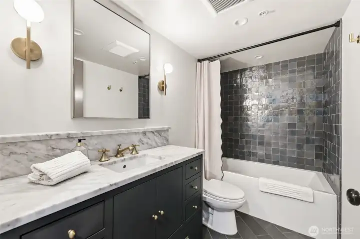 Full bathroom with Waterworks faucets.