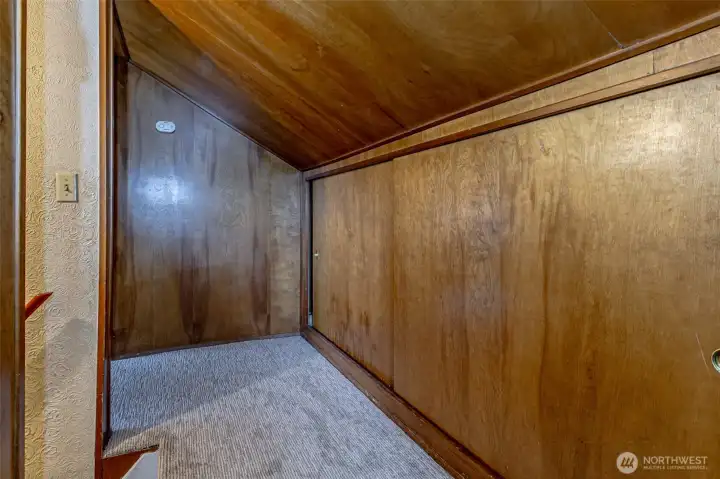 Closet at top of the stairs