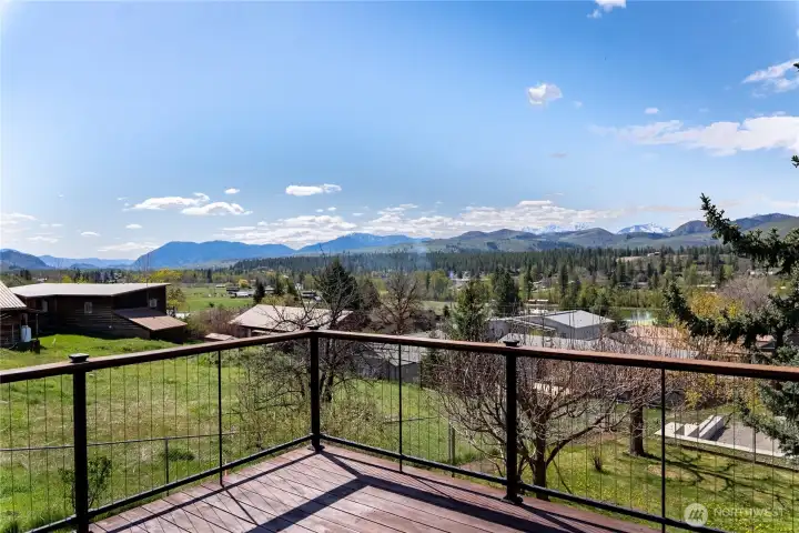 Views from your 12x24 cedar deck with stainless steel wire and railings.  Hard wired lighting set up on a timer.