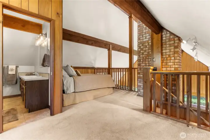 Upstairs loft with bathroom. Newer unique bath lighting from Seattle lighting with a new fan.