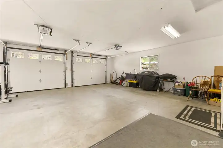 New garage doors with windows were installed in 2025.