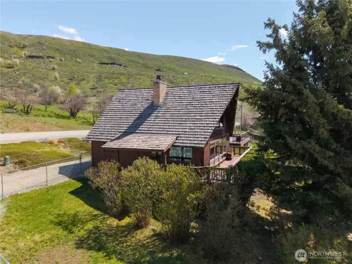 House roofing is premium cedar shake from Canada. Hand dipped with fireproof coating and installed by TTT Roofing.