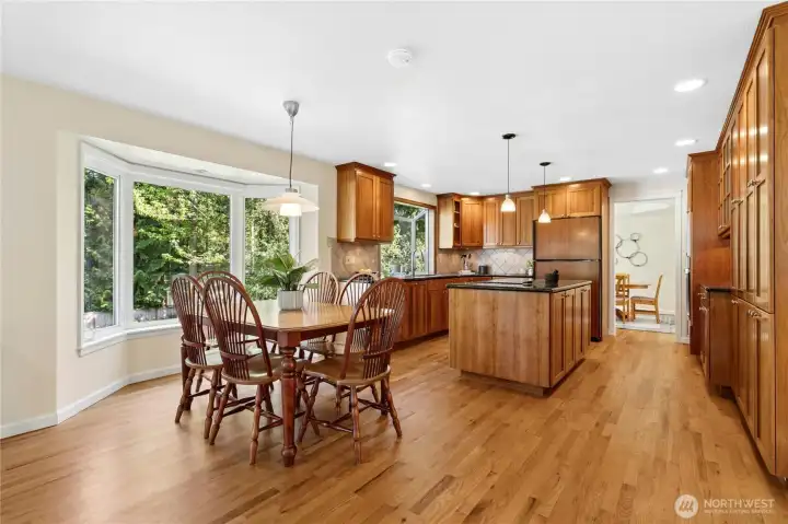 Morning light pours into this breakfast nook like it was planned that way — because it was