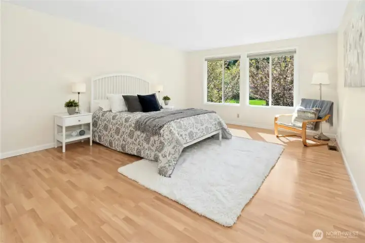 Laminate floors in the primary suite look the part without the upkeep — clean, consistent, and ready for whatever you bring to the space