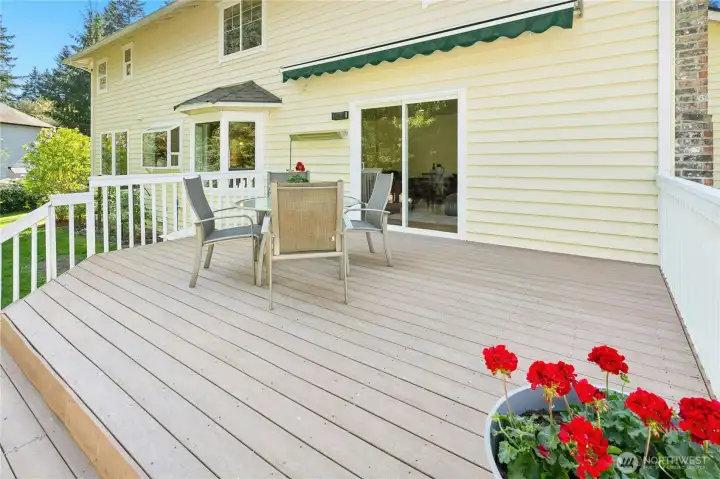 The deck off the slider makes the inside and outside feel like one continuous space.