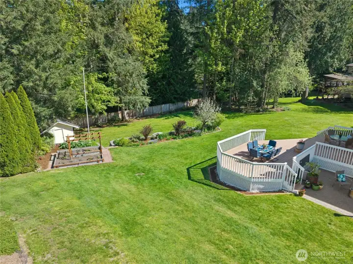 That lawn isn't just mostly flat — it's genuinely usable, and flat yards in the Pacific Northwest are something you don't take for granted. Room to play, room to breathe, room to make it yours.