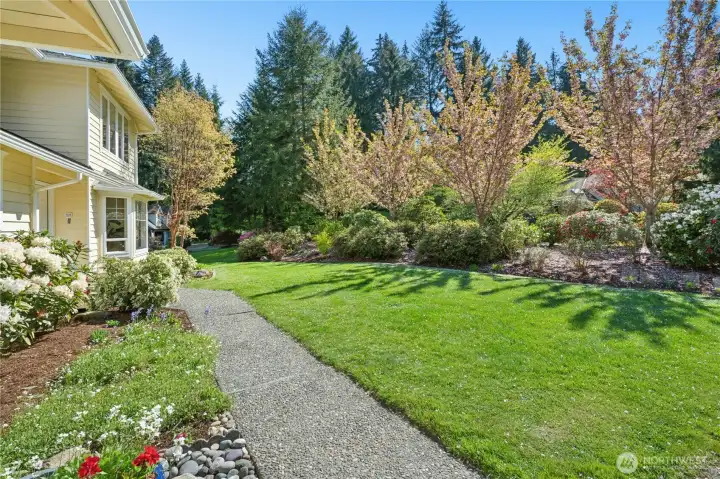 The tree coverage around this property from this angle is the story — surrounded but not crowded, private but not remote