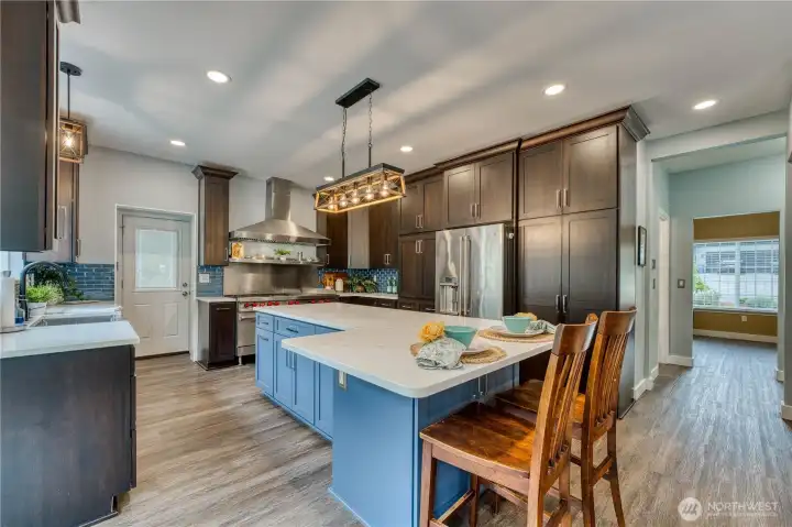 Newly updated this kitchen is sure to please with quartz counters and custom cabinetry.