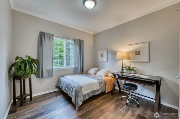Bedroom number 2 with newer laminate floor.