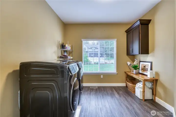Mainfloor laundry room is extra large and conveniently located.