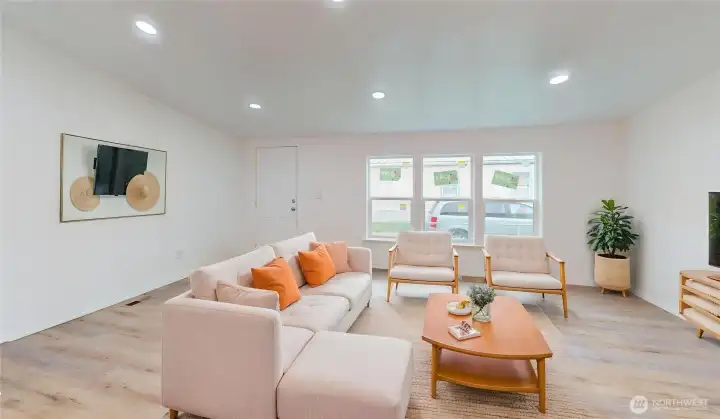 Virtually staged photo of the living room.