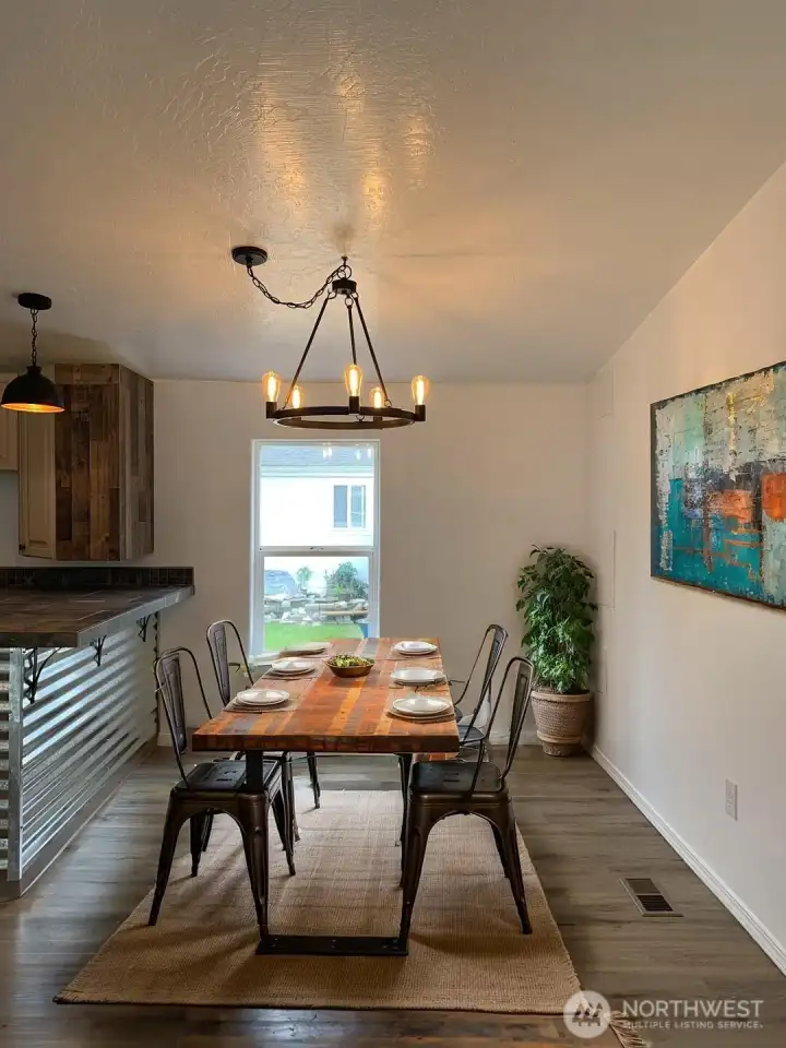 Virtually staged view of the dining room.