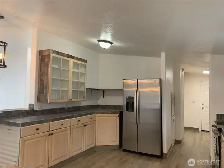 Additional view of the kitchen.